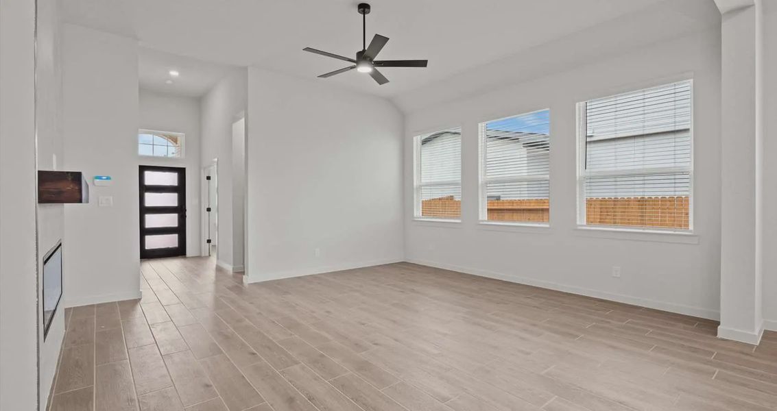 Representative unfurnished interior of a home built from the Rhyan by Chesmar Homes in Stream Waters, Buda (Image 6).