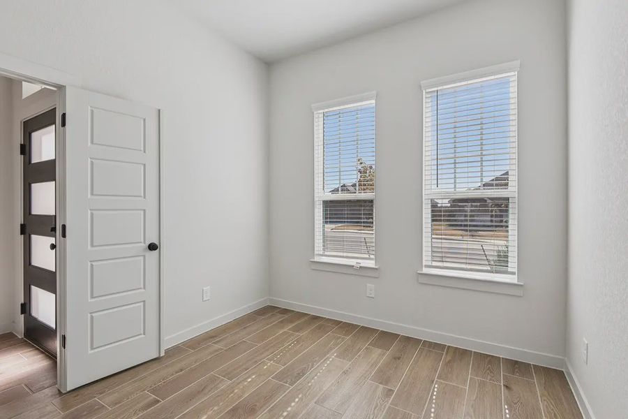 Representative unfurnished interior of a home built from the Rhyan by Chesmar Homes in Stream Waters, Seguin (Image 16).