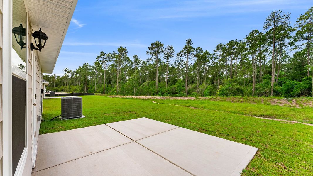 Exterior details and patio area of a home in Chateau Nemours, Port Saint Joe (Image 3).