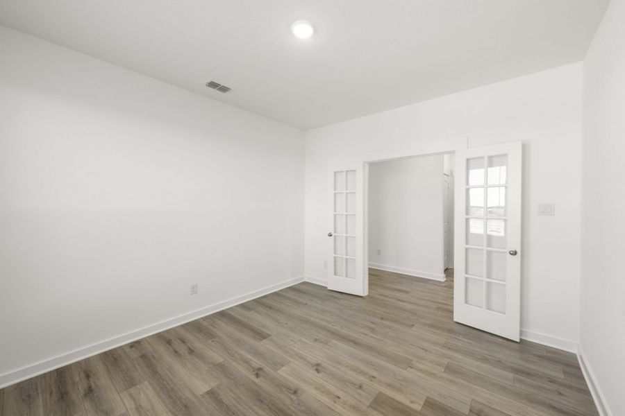 Representative unfurnished interior of a home built from the Ironwood II Hunters Crossing 65s by Brohn Homes in Hunters Crossing, Sealy (Image 20).