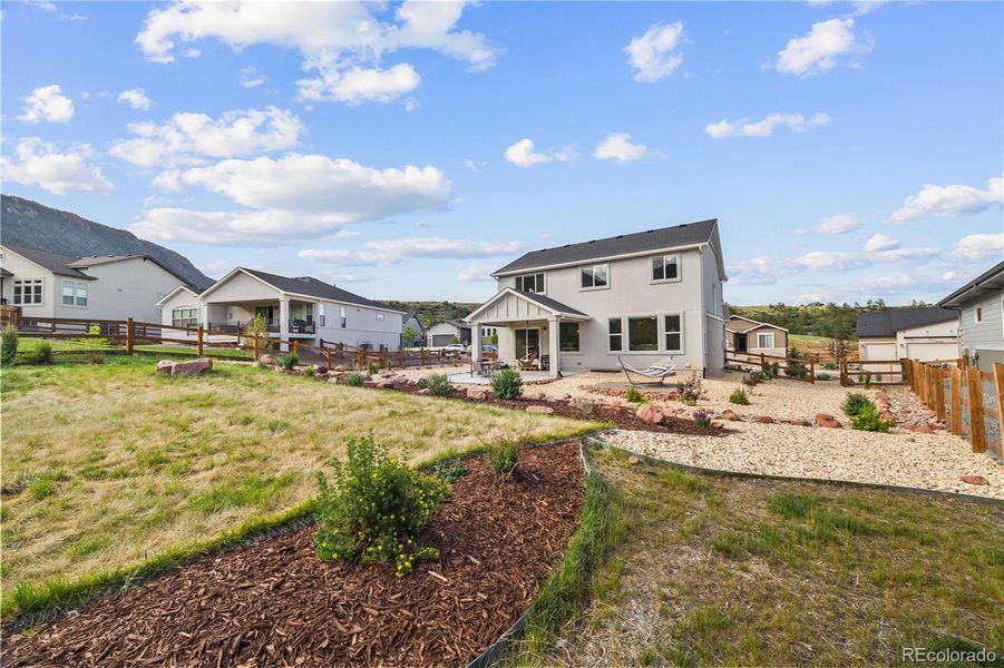 Front exterior of a new home in , Monument, CO, highlighting curb appeal (Image 20).