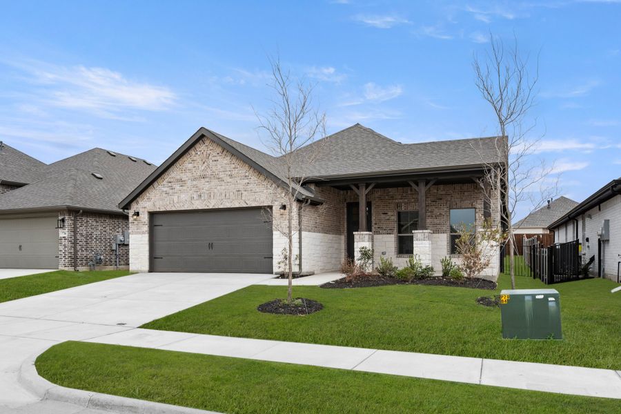 Front exterior of a new home in Silo Mills, Joshua, TX, highlighting curb appeal (Image 21).