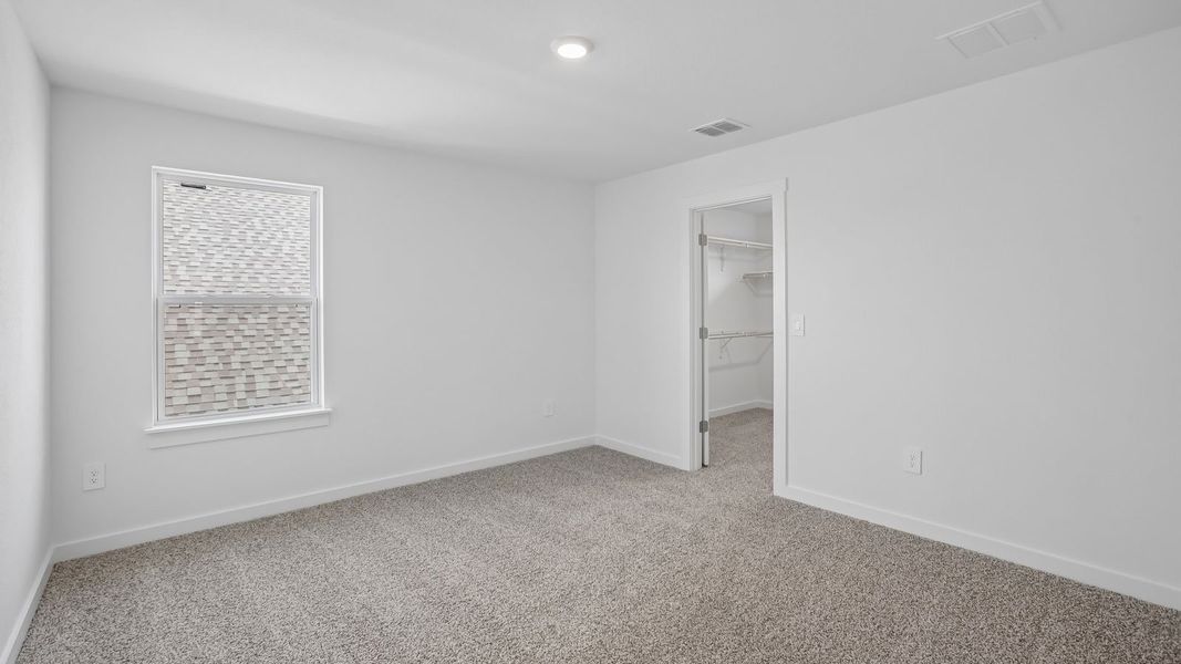 Spacious, unfurnished interior of a new home in Rosenbusch Ranch, Leander (Image 44).