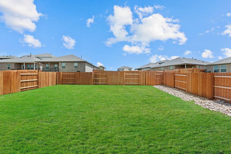 Exterior details and patio area of a home in Bar W Ranch, Leander (Image 19).