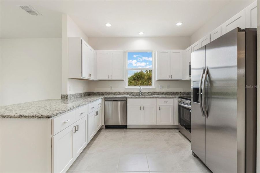 Furnished interior view inside a new home in Grand Isle, Grand Island (Image 3).