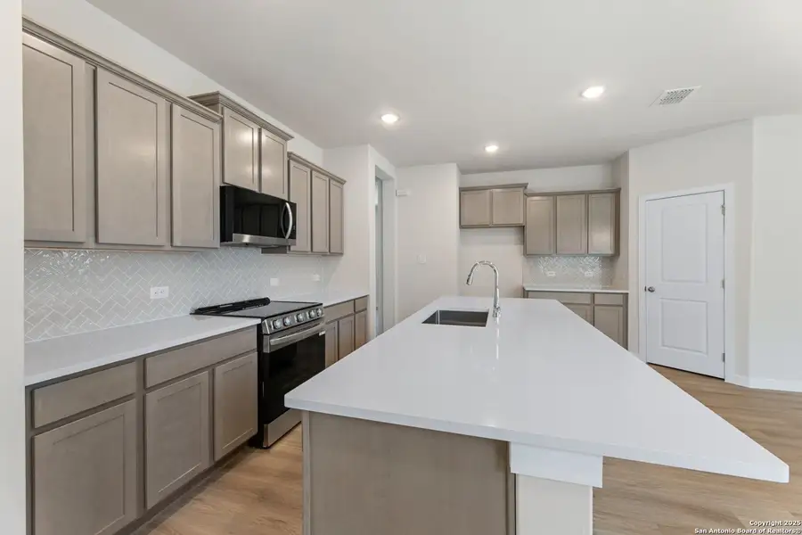 Furnished interior view inside a new home in , New Braunfels (Image 5).