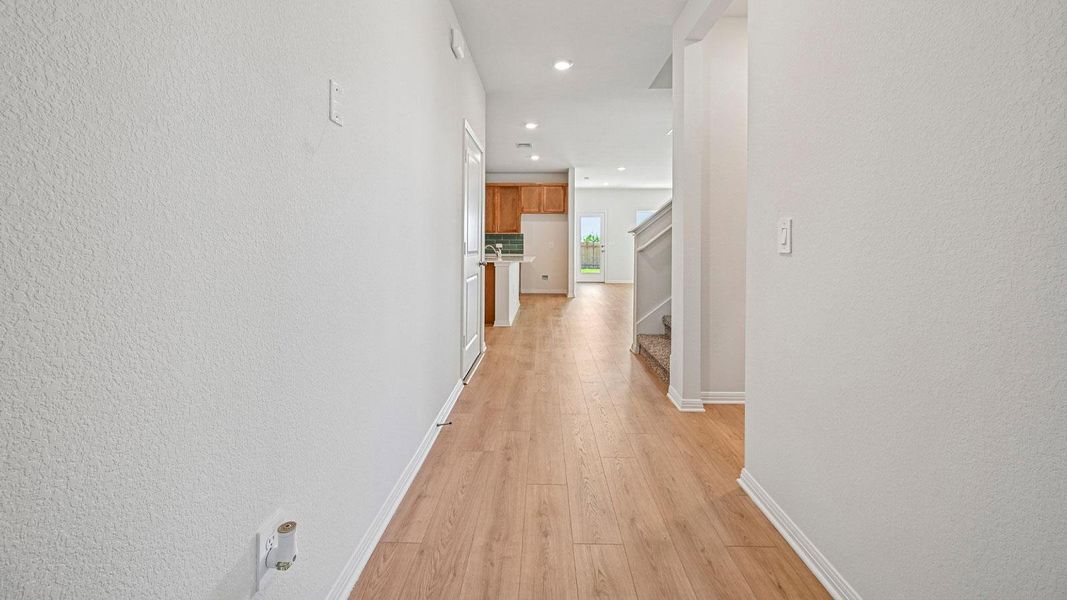 Spacious, unfurnished interior of a new home in Carillon, Manor (Image 31).