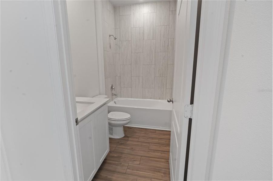 Furnished interior view inside a new home in Peach Crossings, Winter Haven (Image 6).