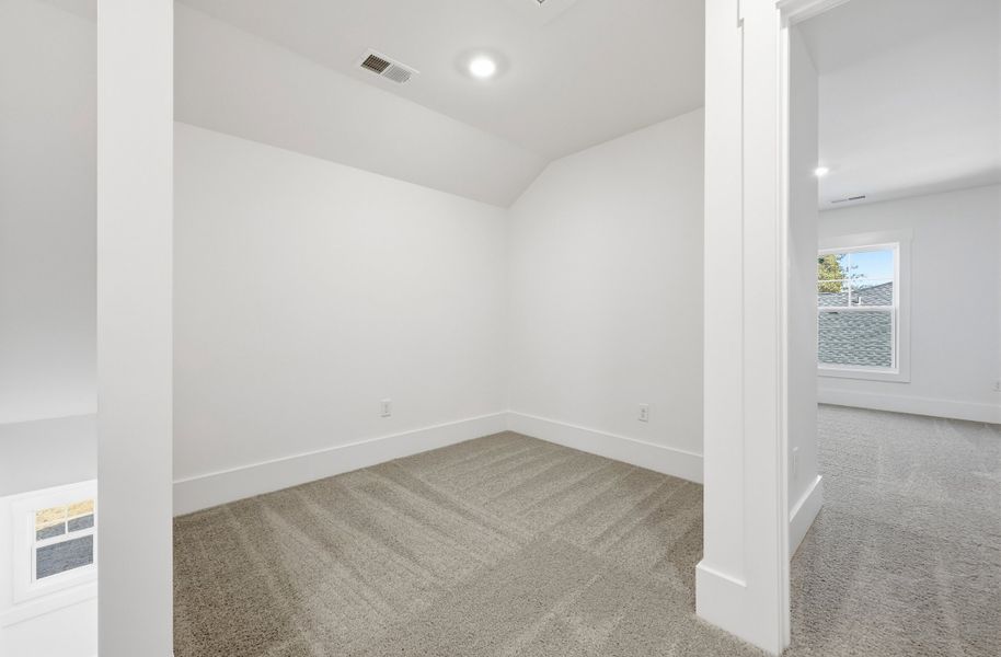 Representative unfurnished interior of a home built from the Montague II by Great Southern Homes in Oak Hollow, Longs (Image 37).