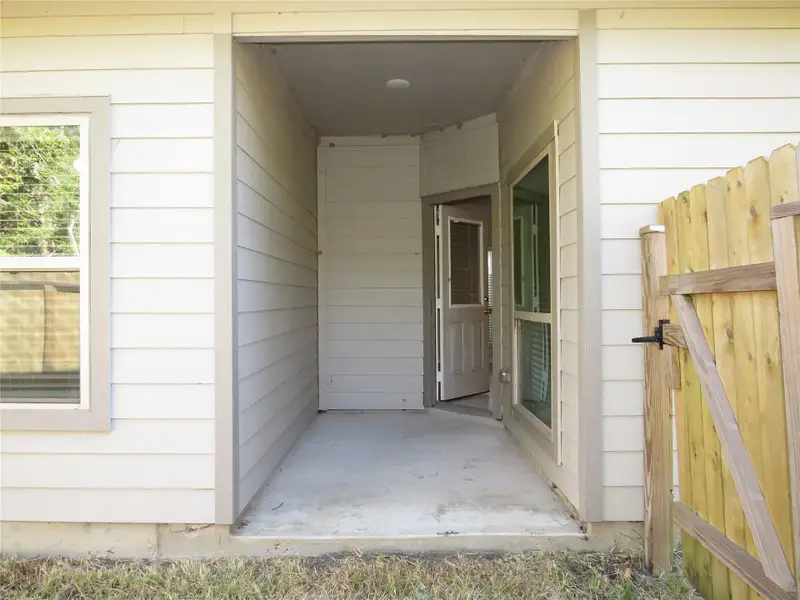 Exterior details and patio area of a home in , Houston (Image 2).