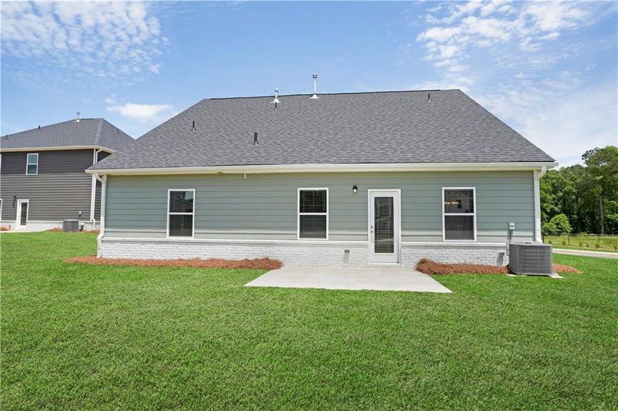 Front exterior of a new home in Conner Springs, Social Circle, GA, highlighting curb appeal (Image 1). Front exterior of a new home in Conner Springs, Social Circle, GA, highlighting curb appeal (Image 1).
