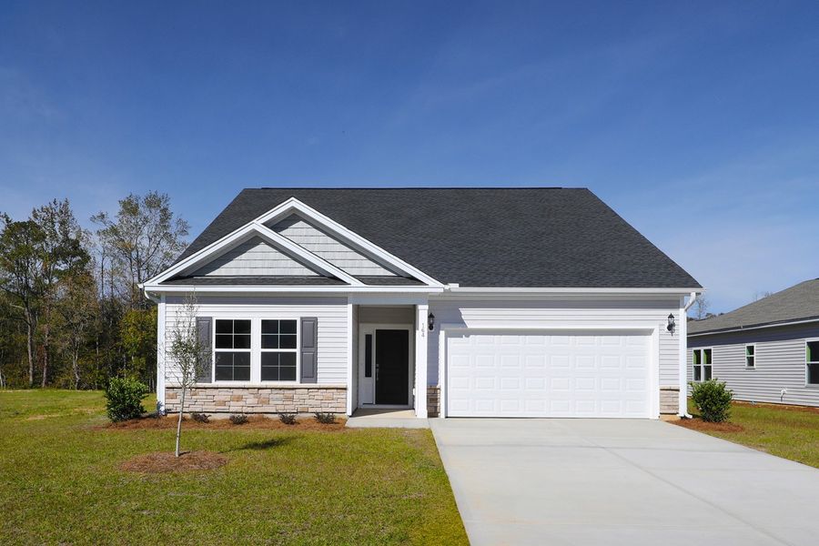 Front exterior of a new home in Jordan Grove, Conway, SC, highlighting curb appeal (Image 1).