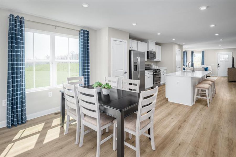 Representative furnished interior of a home built from the Grand Nassau by Ryan Homes in Hope Pointe Townhomes, North Myrtle Beach (Image 9).