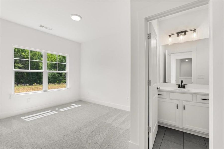Spacious, unfurnished interior of a new home in Traditions of Braselton, Jefferson (Image 22).