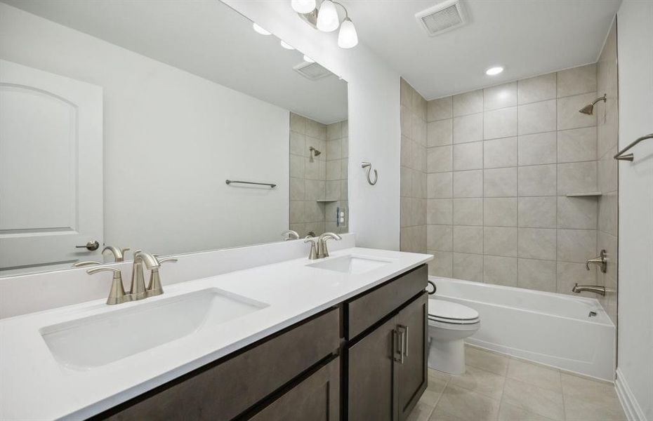 Upgraded secondary bathroom *real home pictured