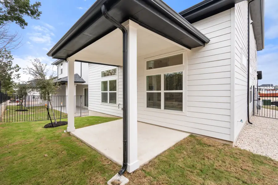 Exterior details and patio area of a home in Foxfield, Austin (Image 2). Exterior details and patio area of a home in Foxfield, Austin (Image 2).
