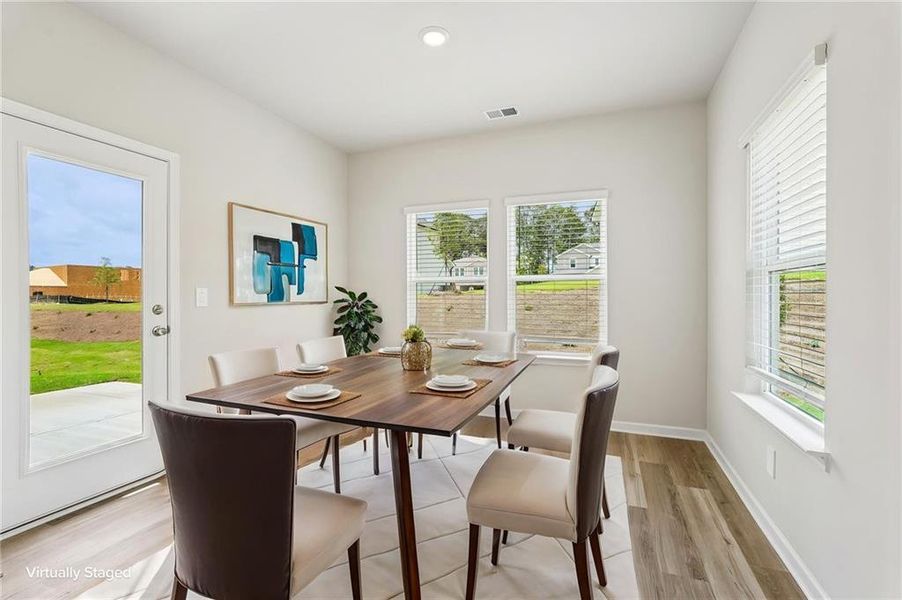 Furnished interior view inside a new home in Northwoods at Mirror Lake, Villa Rica (Image 18).