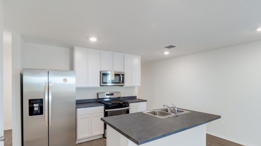 Furnished interior view inside a new home in Prairie Lakes, Buda (Image 4).
