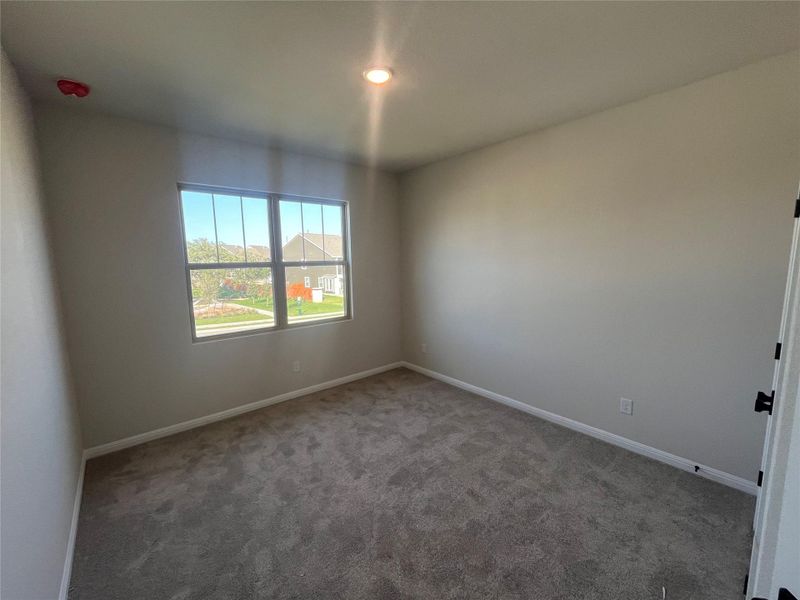 Spacious, unfurnished interior of a new home in The Cottages at Lariat, Liberty Hill (Image 25).