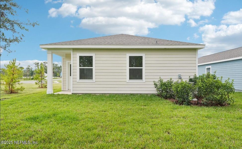 Exterior details and patio area of a home in , Palm Coast (Image 2). Exterior details and patio area of a home in , Palm Coast (Image 2).