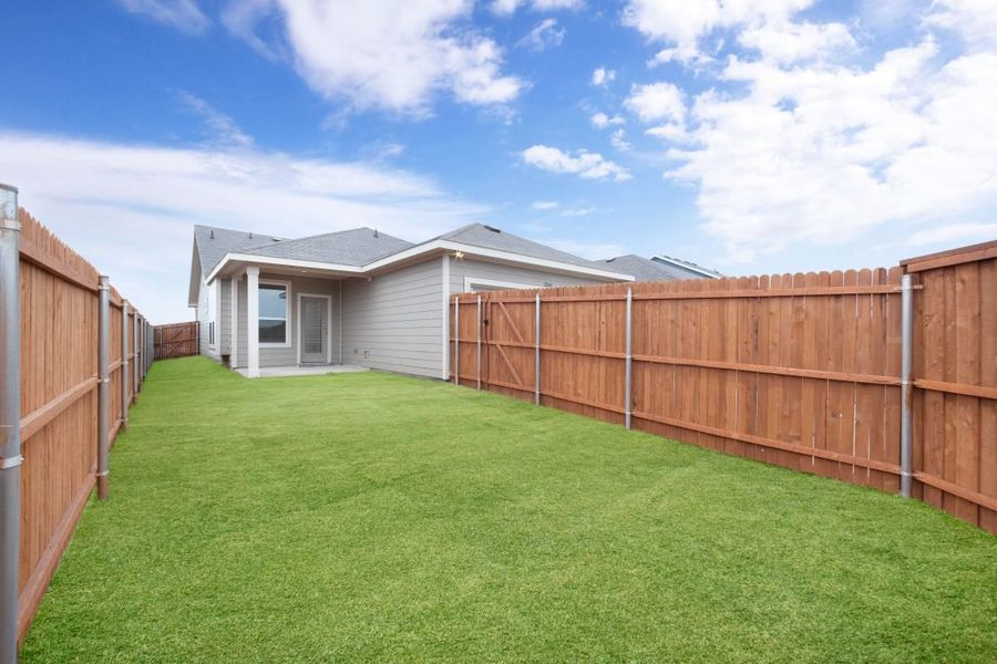 Representative exterior photo of a completed home built from the Joliet by Impression Homes in Heartland, Heartland, TX (Image 25).