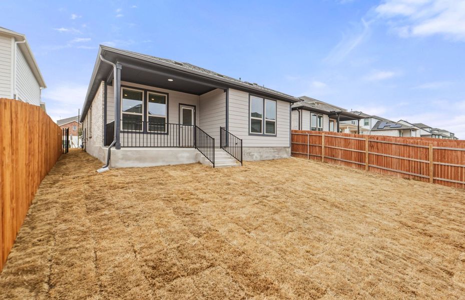 Exterior details and patio area of a home in Saddleback at Santa Rita Ranch, Liberty Hill (Image 22).