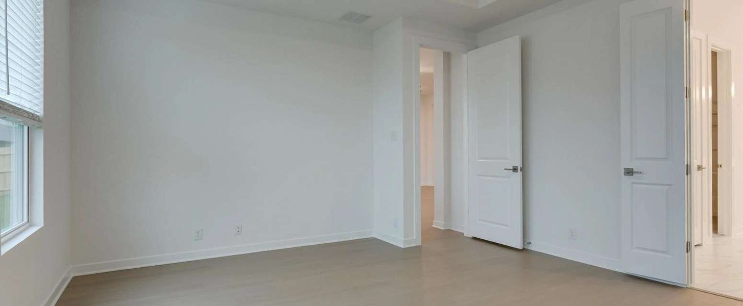 Representative unfurnished interior of a home built from the Blanco by Ashton Woods in Saddlebrook Ranch, Schertz (Image 15).