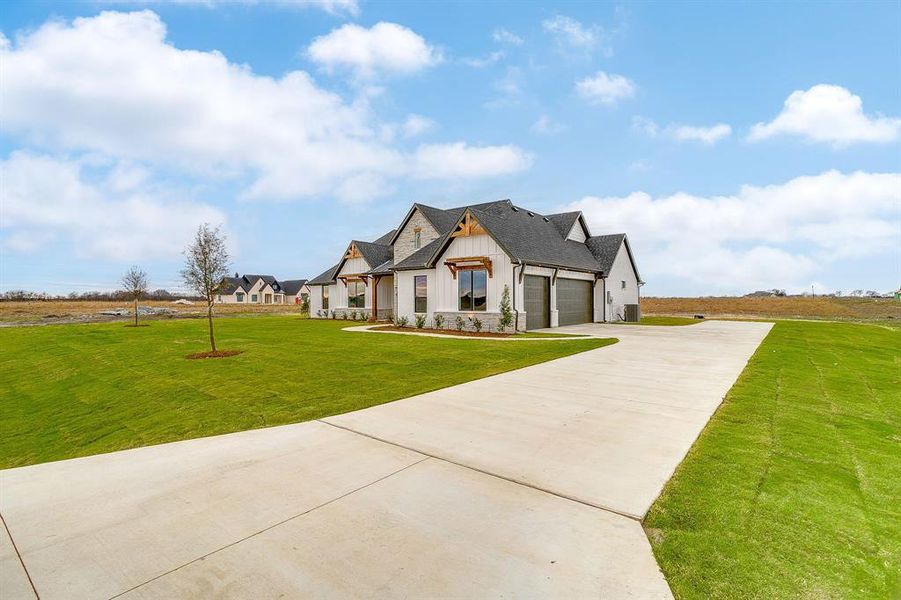 Front exterior of a new home in , Waxahachie, TX, highlighting curb appeal (Image 23).