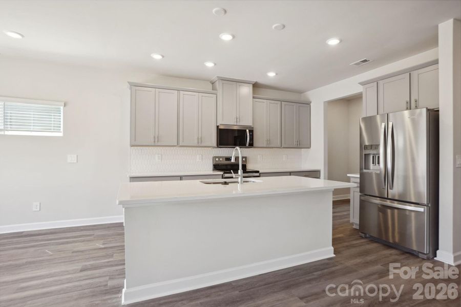 Photo is not of the actual home, but is an inspirational photo of builder’s model home and may depict options, furnishings, and/or decorator features that are not included