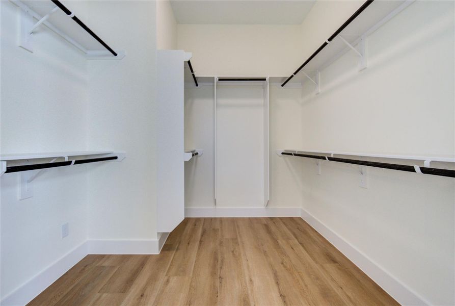 Primary walk-in closet.
