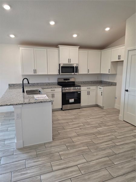 Furnished interior view inside a new home in Pine Bluff, Spring Hill (Image 3).