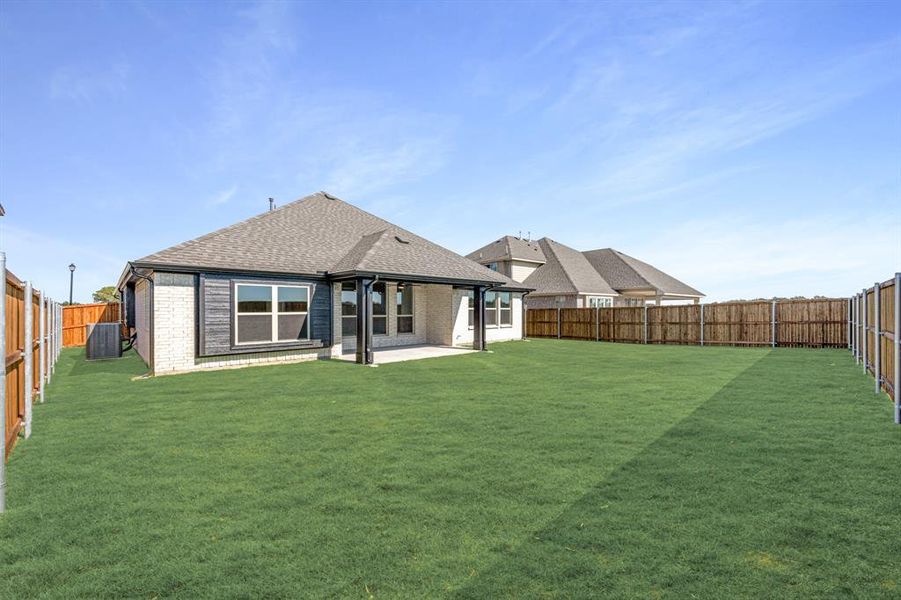 Exterior details and patio area of a home in Stone River Glen 60s, Royse City (Image 23). Exterior details and patio area of a home in Stone River Glen 60s, Royse City (Image 23).