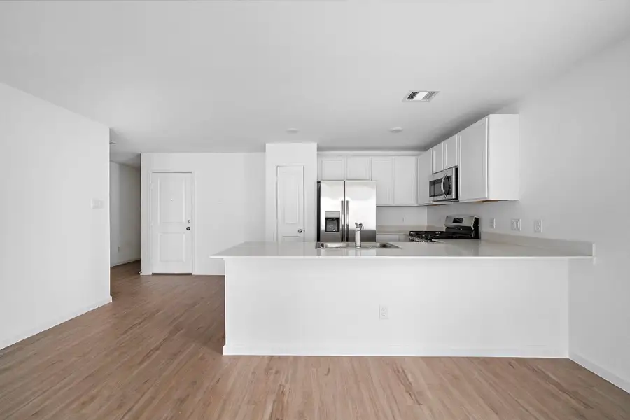 Breakfast area and breakfast bar off of the kitchen.