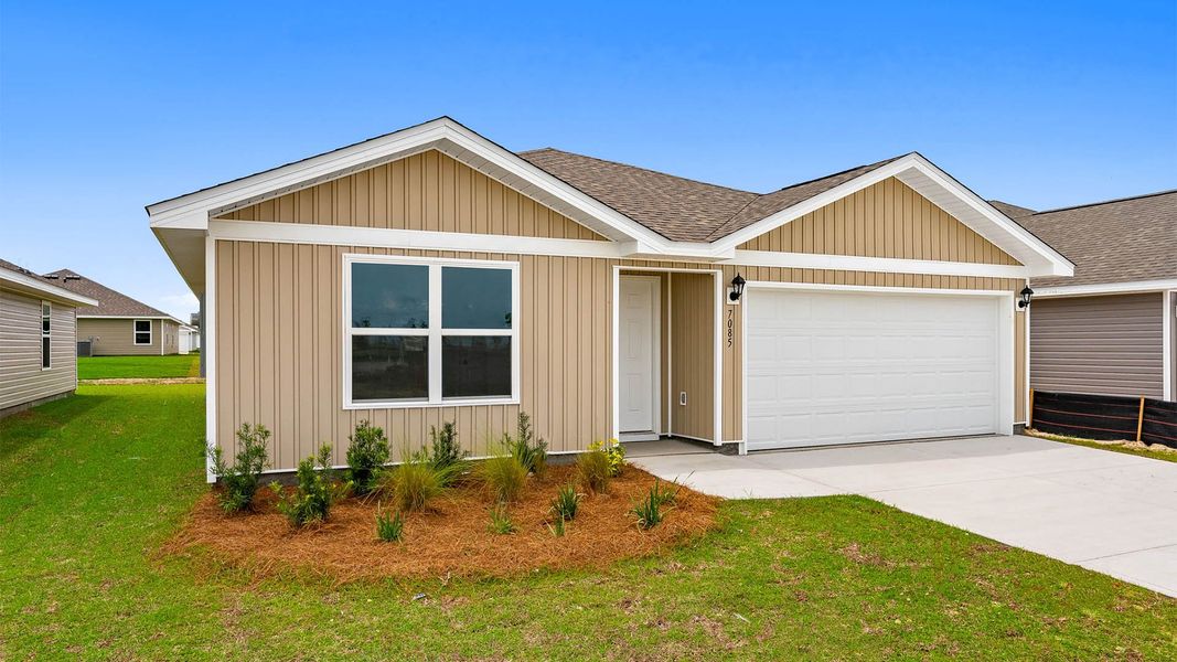 Front exterior of a new home in Liberty, Panama City, FL, highlighting curb appeal (Image 2). Front exterior of a new home in Liberty, Panama City, FL, highlighting curb appeal (Image 2).