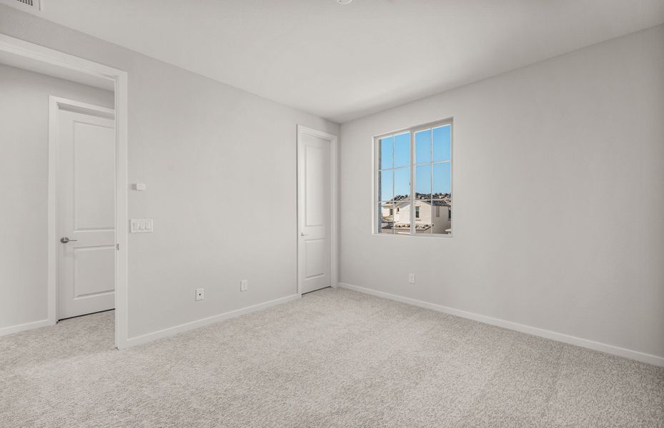 Spacious, unfurnished interior of a new home in Legado West, Queen Creek (Image 21).