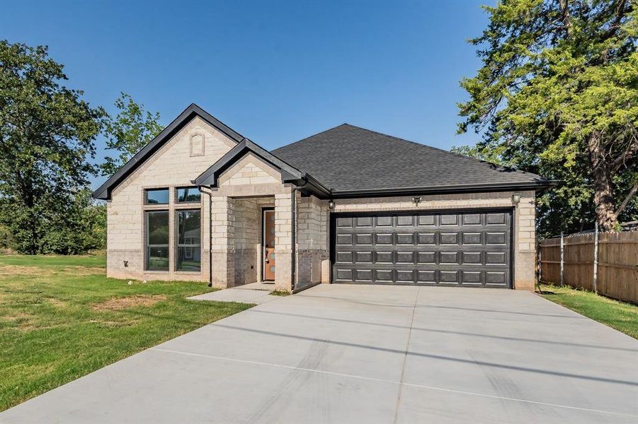 Front exterior of a new home in , Fort Worth, TX, highlighting curb appeal (Image 22).