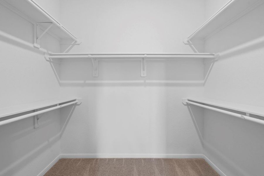 A view of your large primary walk-in Closet A view of your large primary walk-in Closet