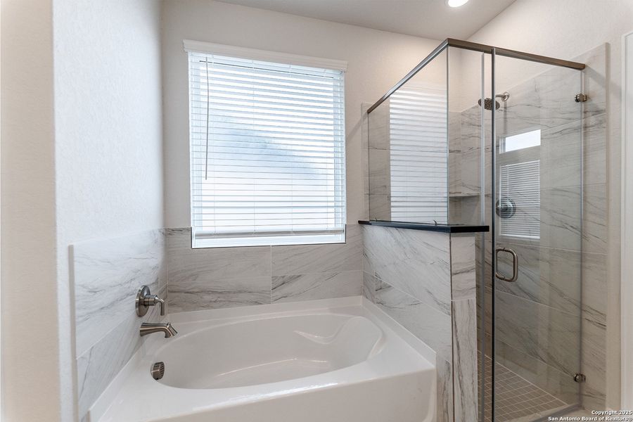 Furnished interior view inside a new home in The Woodlands at Medina Hills, Mico (Image 6).