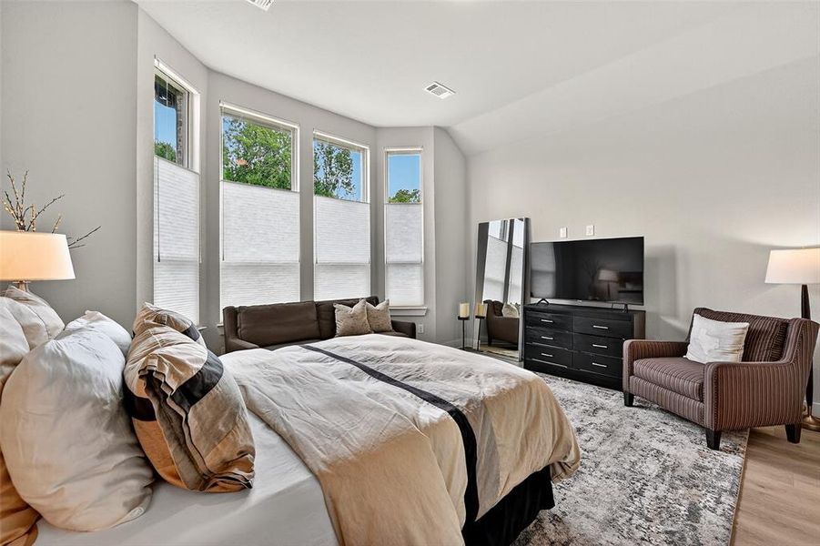 Bedroom featuring light wood-style floors Bedroom featuring light wood-style floors