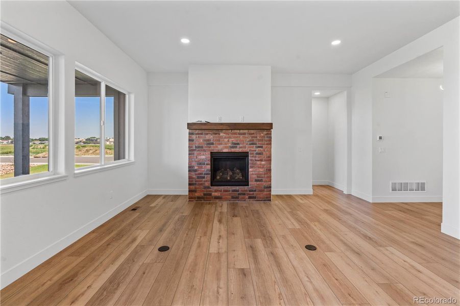Main floor living with brick fireplace