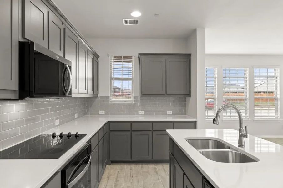 Front exterior of a new home in Sanger Circle, Sanger, TX, highlighting curb appeal (Image 23).