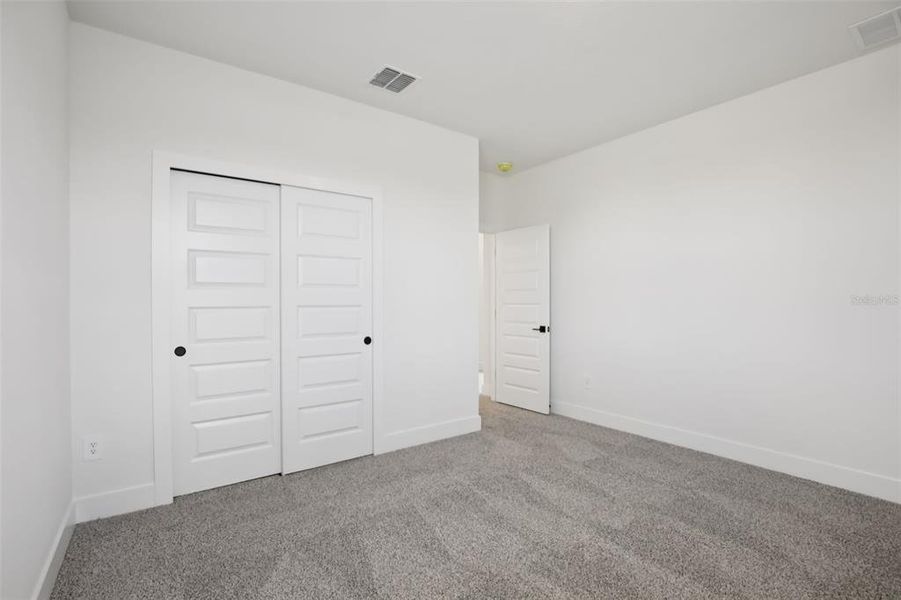 Spacious, unfurnished interior of a new home in Magnolia Bay - Reserve Series, Nokomis (Image 35).