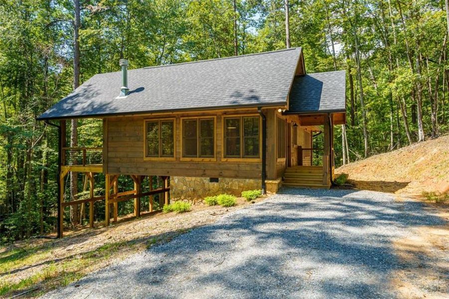 Exterior details and patio area of a home in , Cherry Log (Image 18).