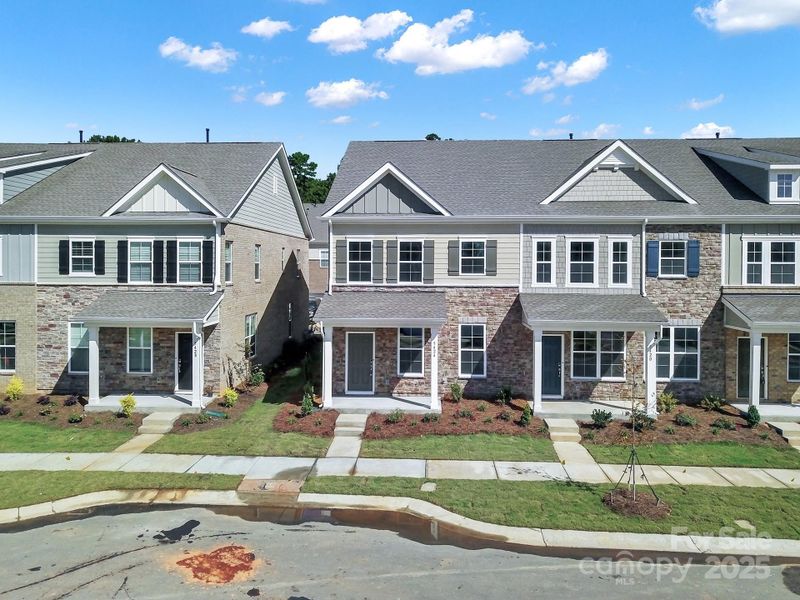 Front exterior of a new home in , Mint Hill, NC, highlighting curb appeal (Image 18).