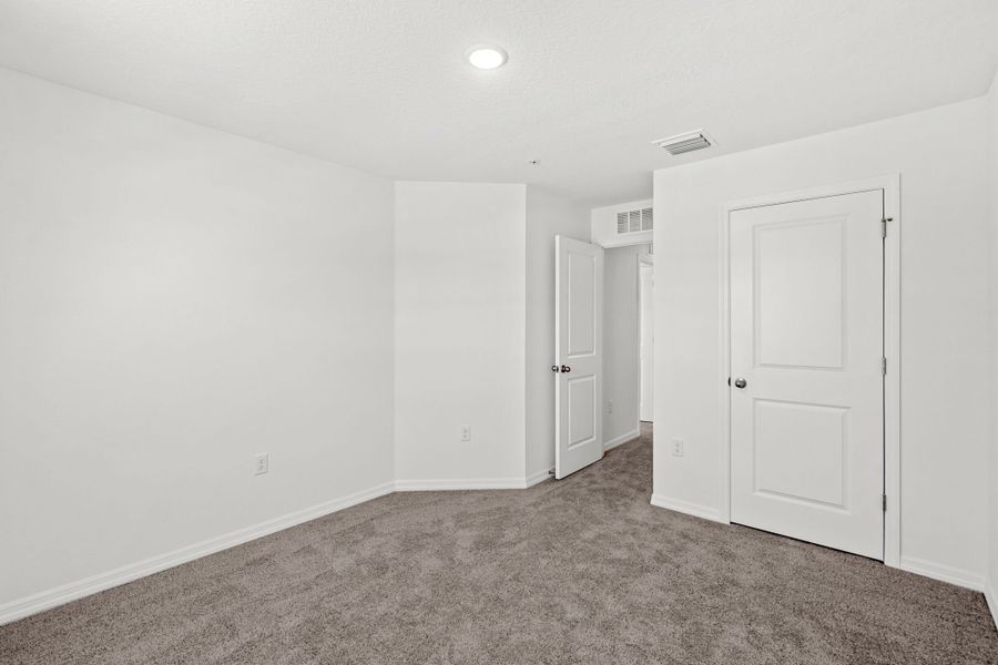 Representative unfurnished interior of a home built from the Abbey by Hartizen Homes in Delaney Reserve, Deland (Image 64).
