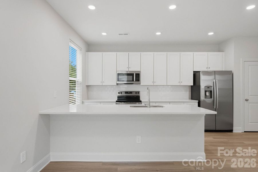 Furnished interior view inside a new home in , Mooresville (Image 7).