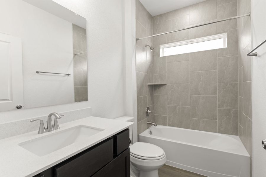 Furnished interior view inside a new home in Village at Three Oaks, Seguin (Image 11).