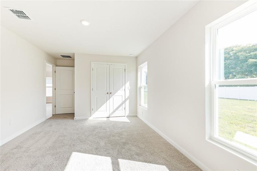 Spacious, unfurnished interior of a new home in Central Parc, North Port (Image 15).