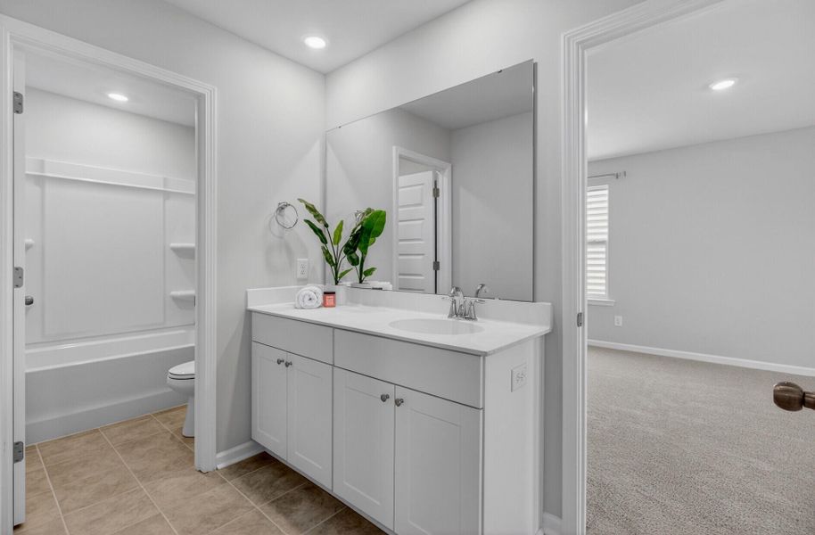Furnished interior view inside a new home in Lindera Preserve at Cane Bay Plantation, Summerville (Image 17).