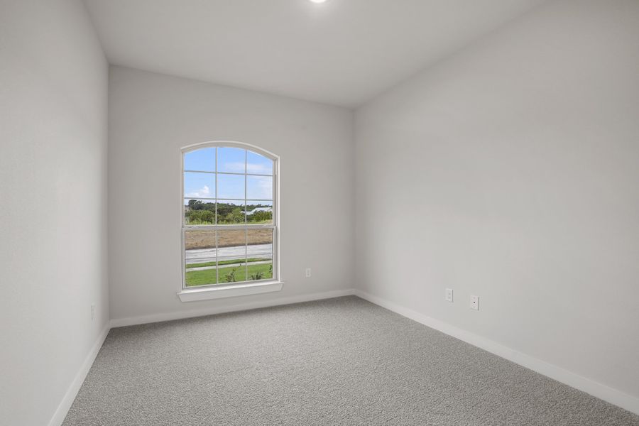 Representative unfurnished interior of a home built from the Waterford III by Cheldan Homes in Stoneview, Glen Rose (Image 40).